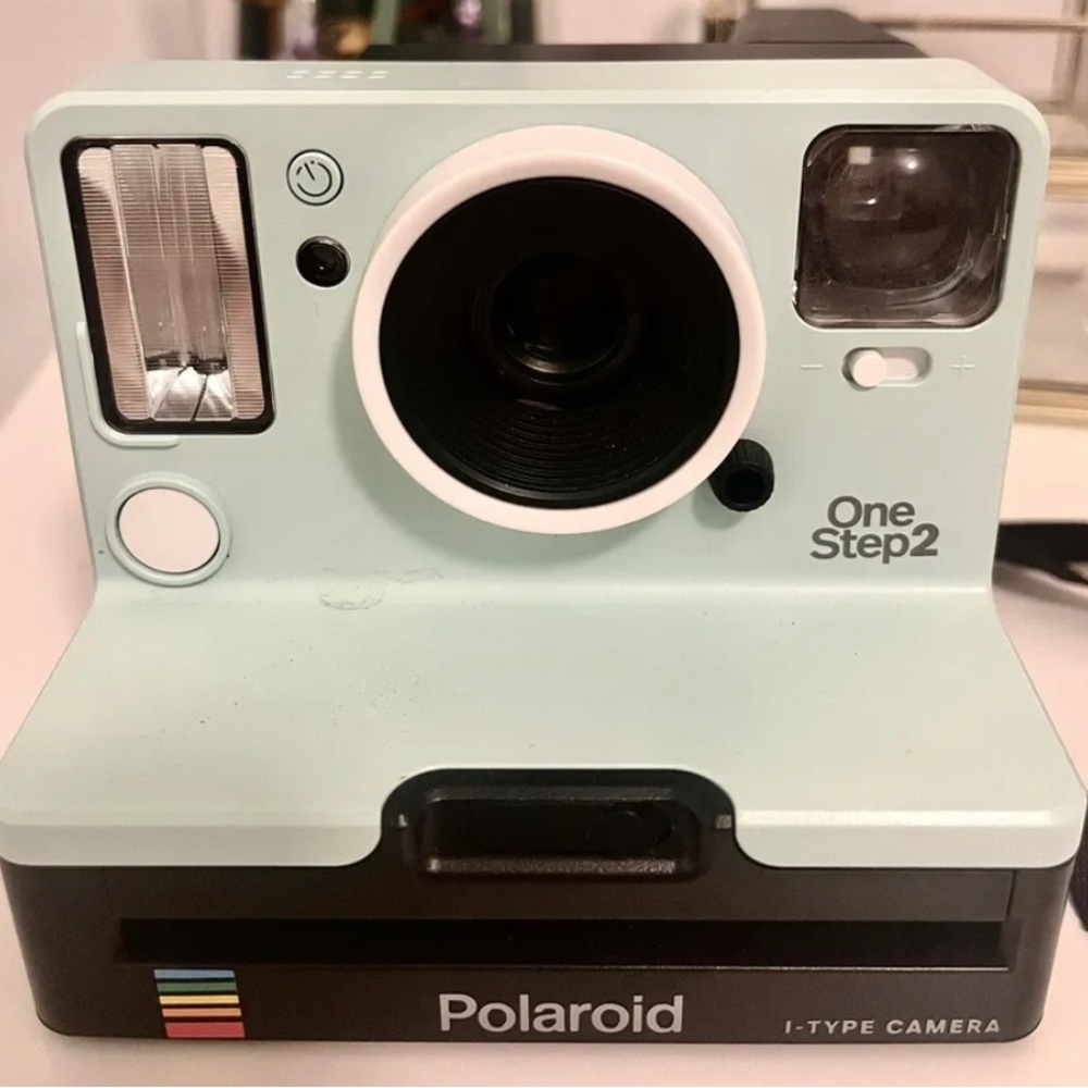 Teal Polaroid camera, OneStep